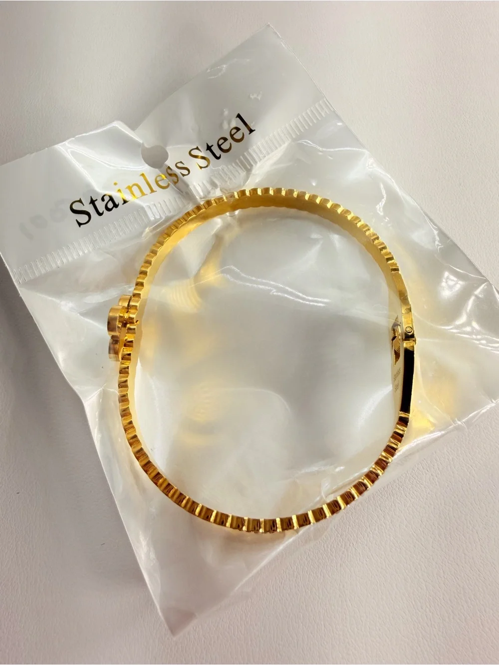 Stainless steel Gold Bangle Bracelet with White Mother-of-Pearl Clover Accent